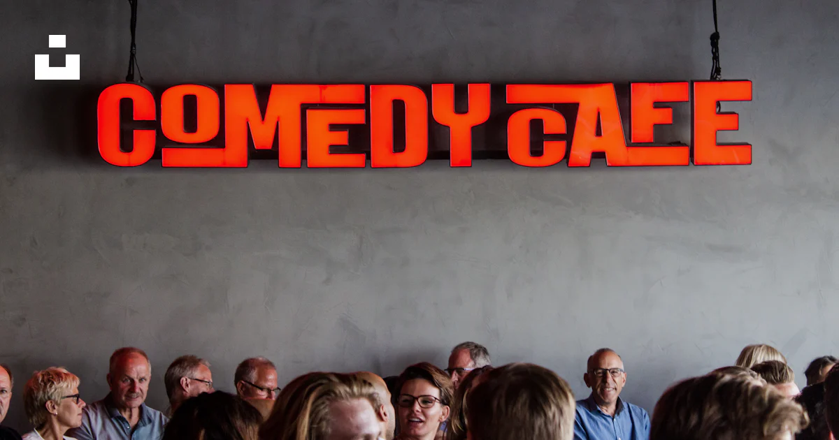 People gathering inside Comedy Cafe building photo – Free Coffee Image ...