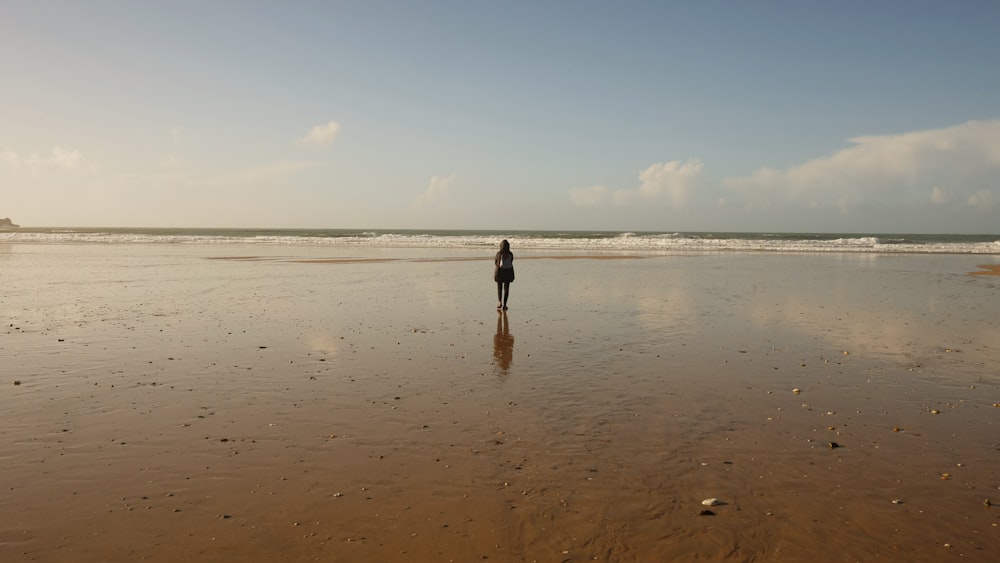 person standing on shore