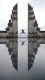person jumping above water