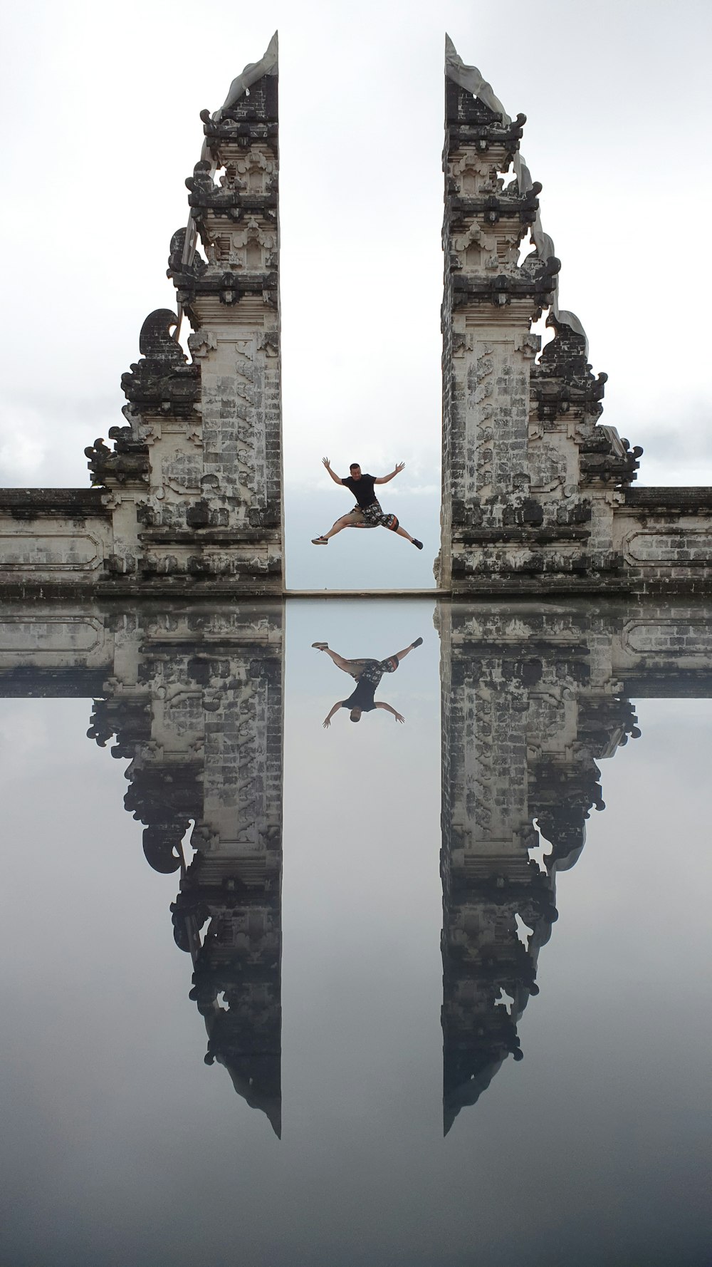 person jumping above water