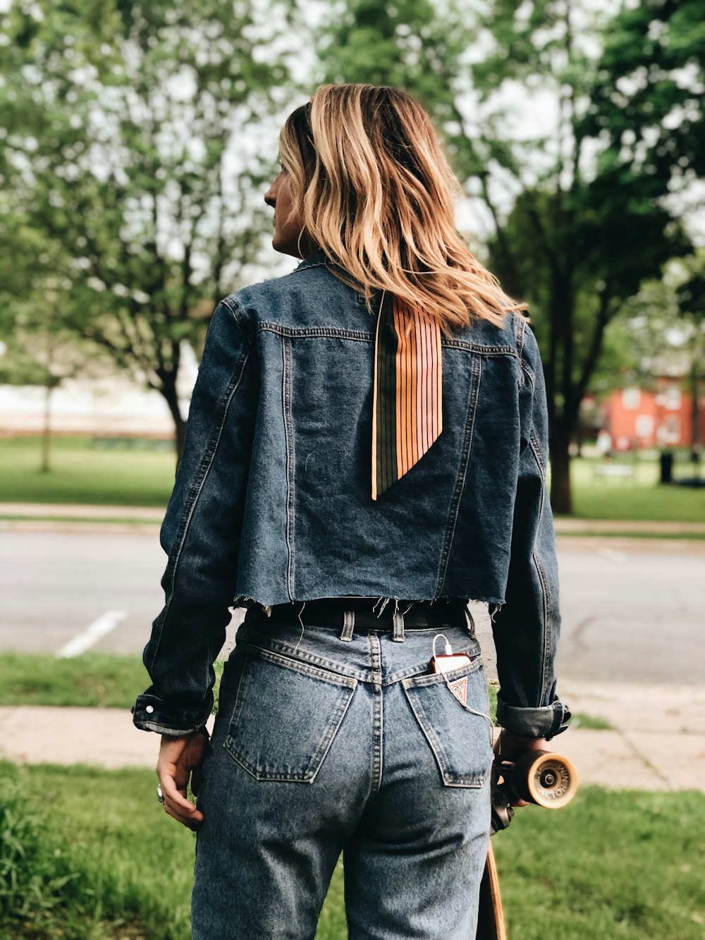 woman standing near road