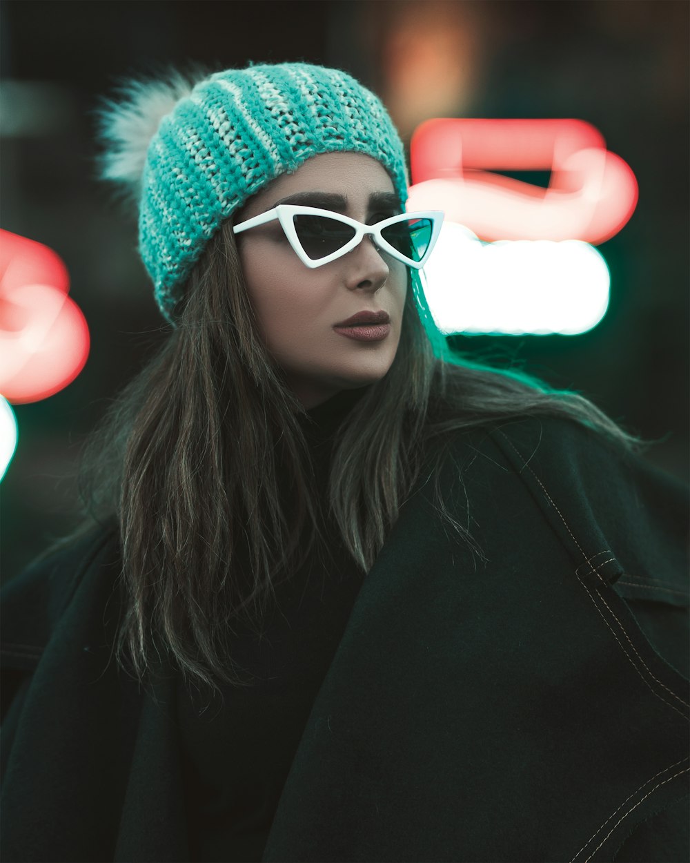 selective focus photography woman wearing white sunglasses