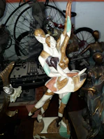 A wedding couple sharing a dance, immortalized in a delicate 3D printed sculpture.