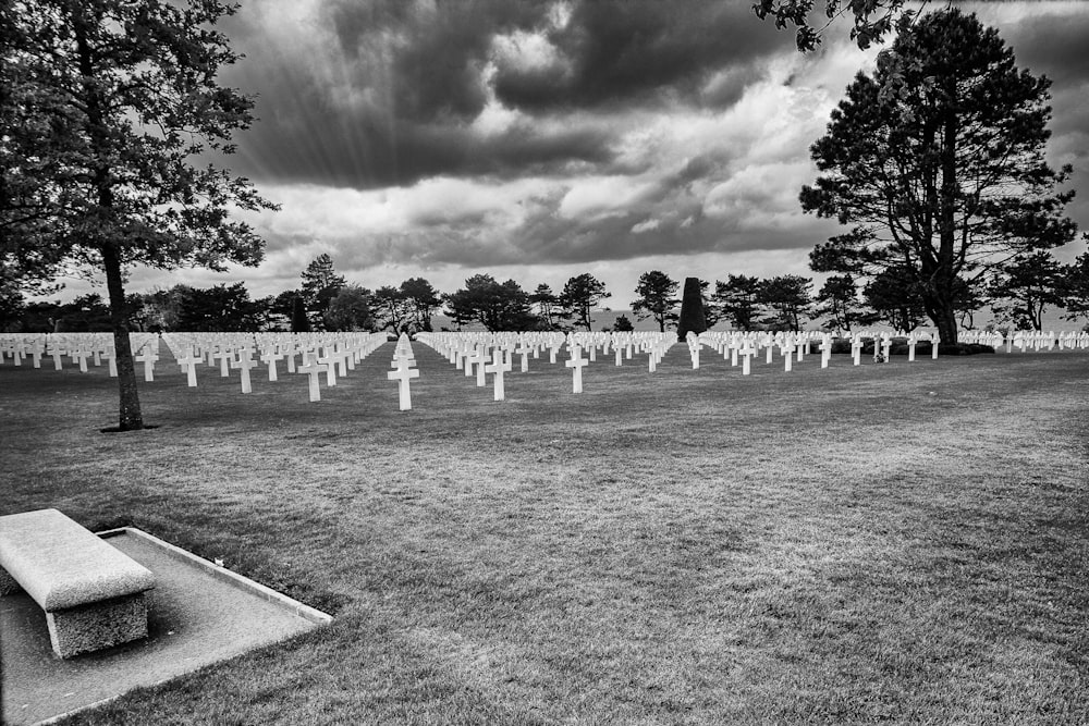 cemetery under cloudy sky