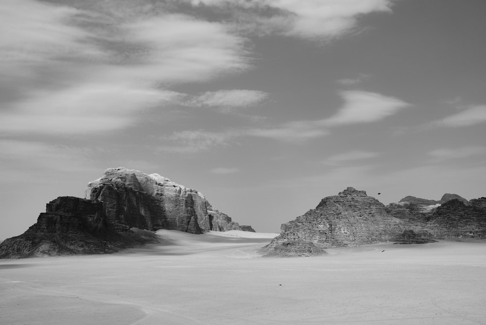 grayscale photography of boulder