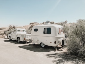 white vehicle parked near plant
