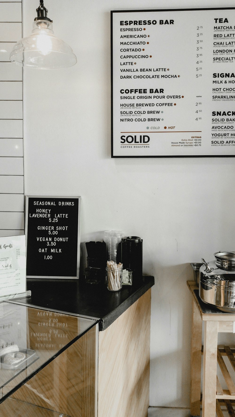 Cafe menu on table and wall