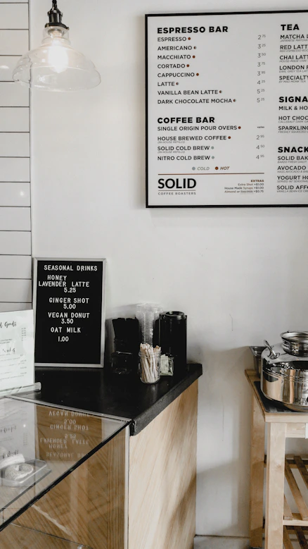 Cafe menu on table and wall