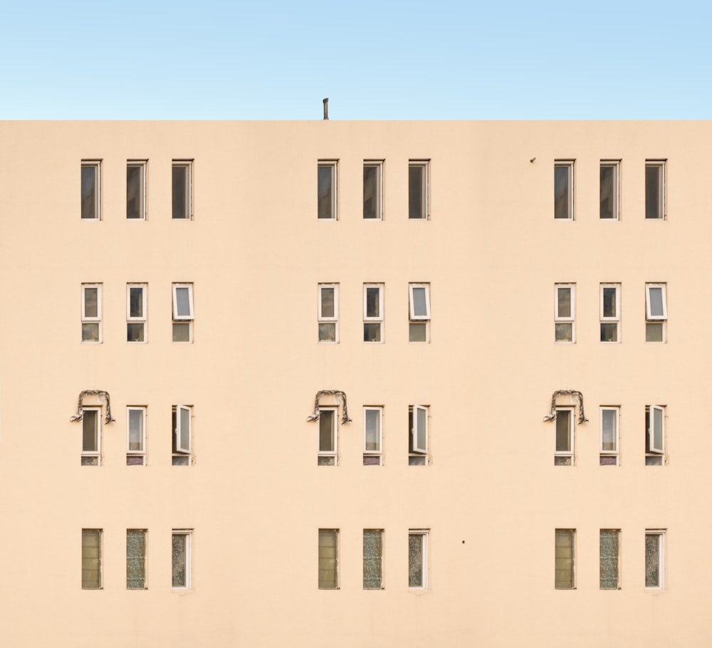 beige high rise concrete building