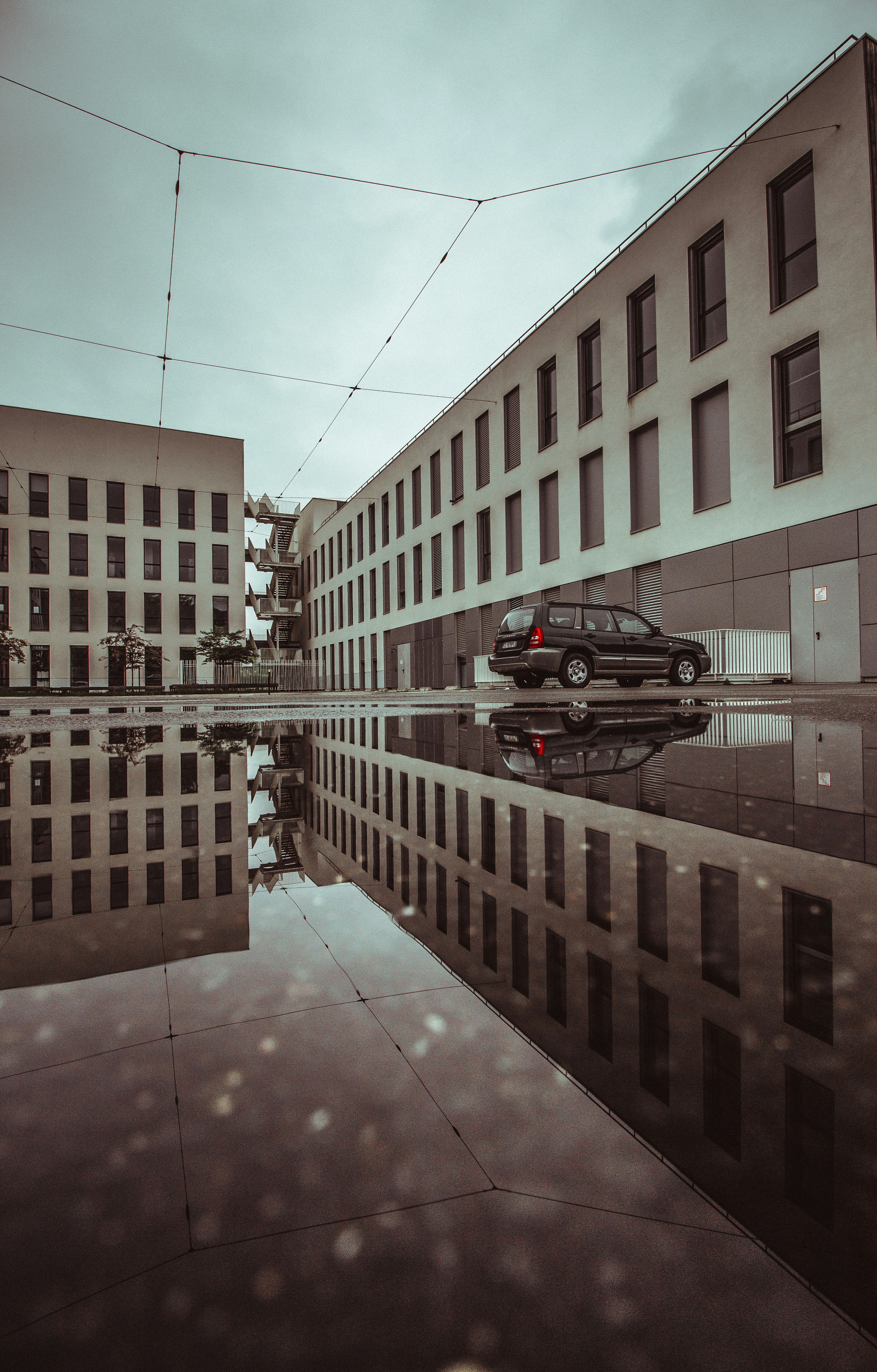 black SUV parked beside building