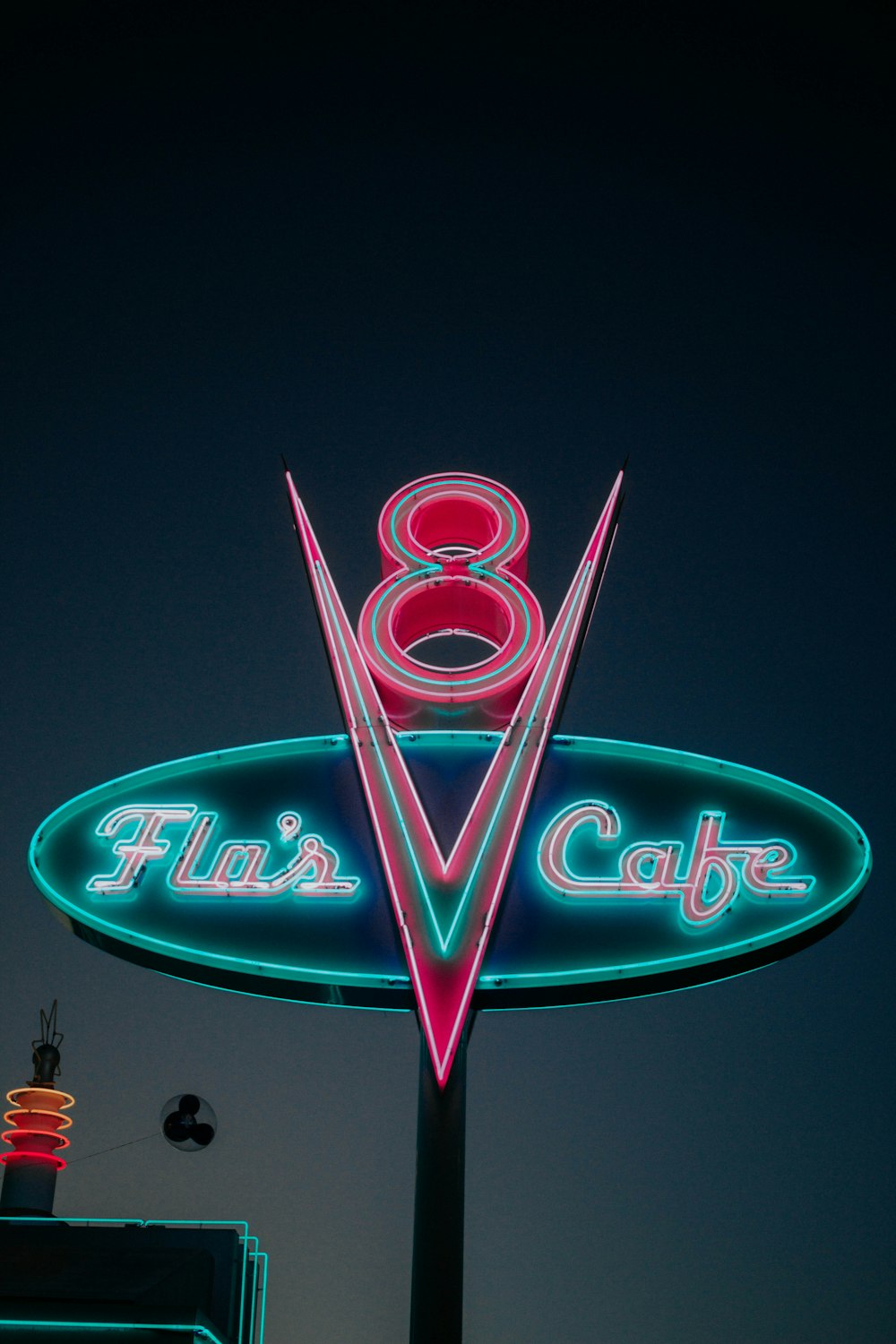 red, green and white Flo's Cafe neon sign