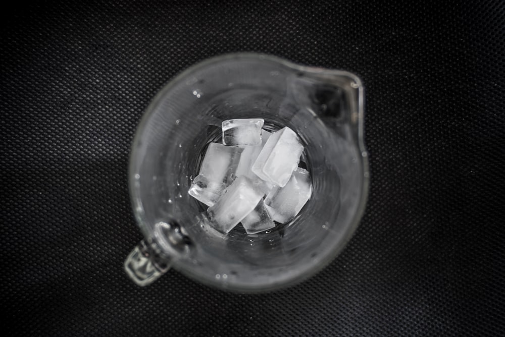 ice cubes inside clear glass pitcher