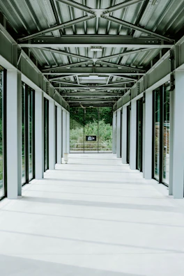 State-of-the-art hospital corridor with natural light streaming through large windows