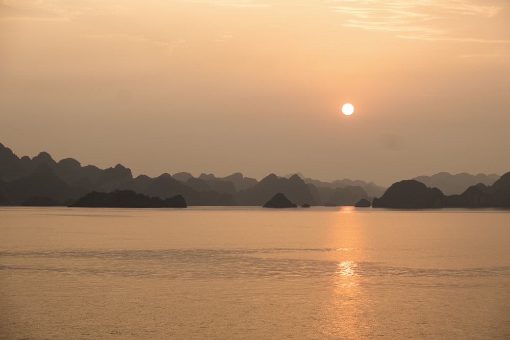 body of water during golden hour