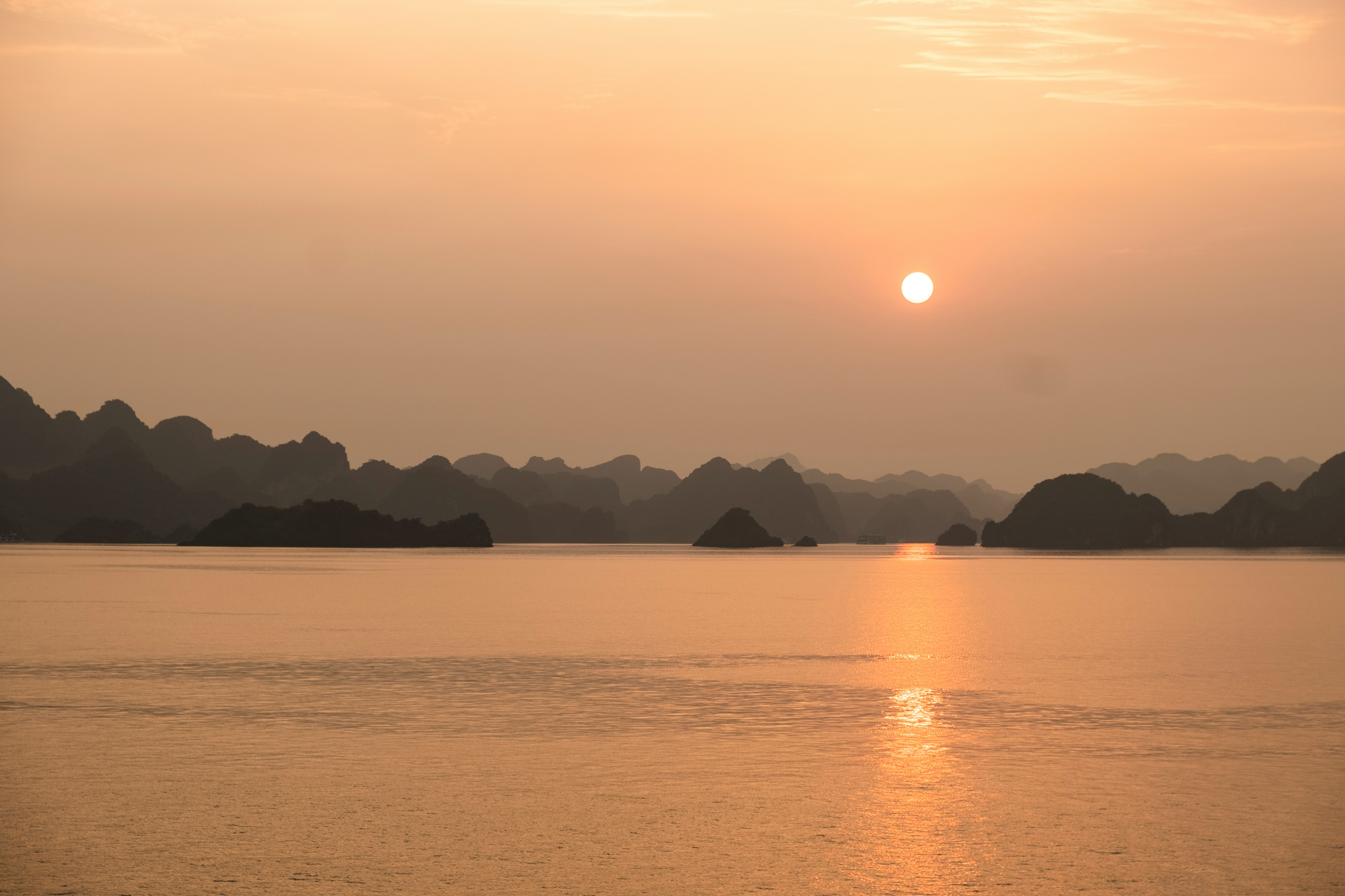 body of water during golden hour