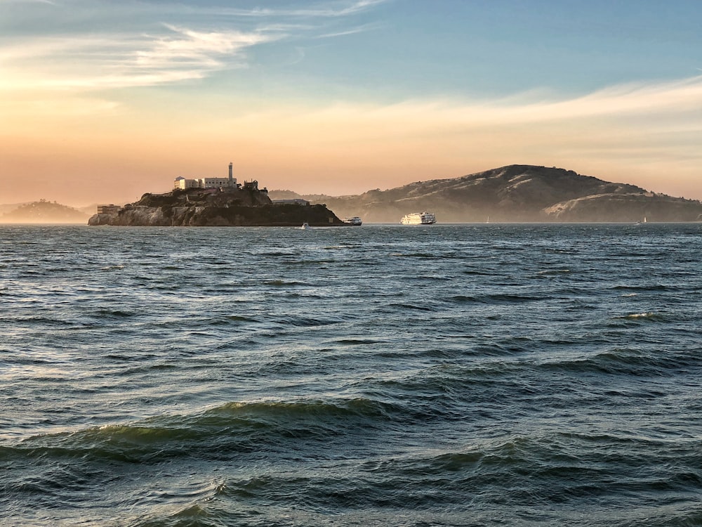 Alcatraz Island in San Francisco Bay under blue and white skies