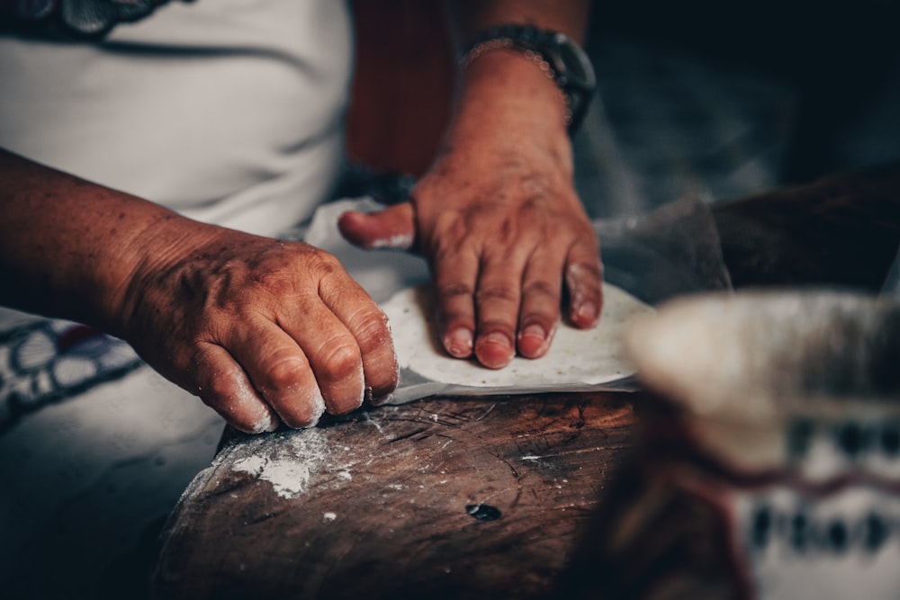 man making roti