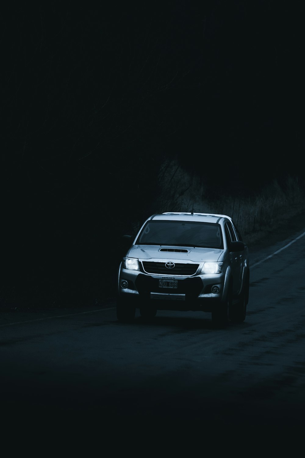 grey SUV at the road