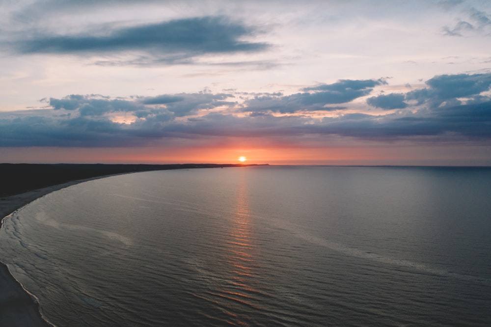 calm sea during sunrise