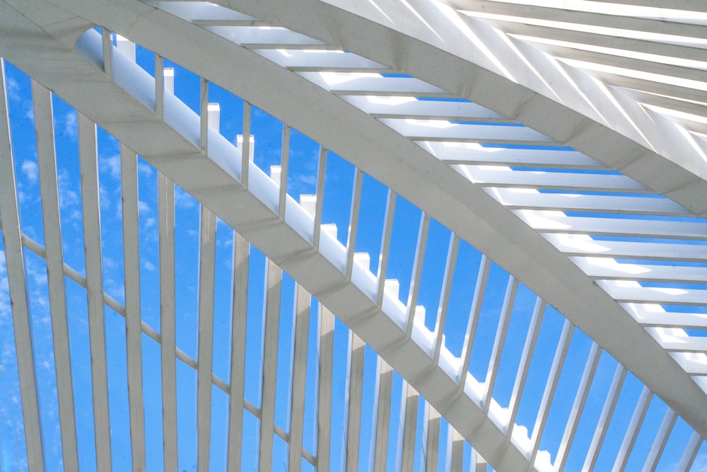 white railings under blue and white skies