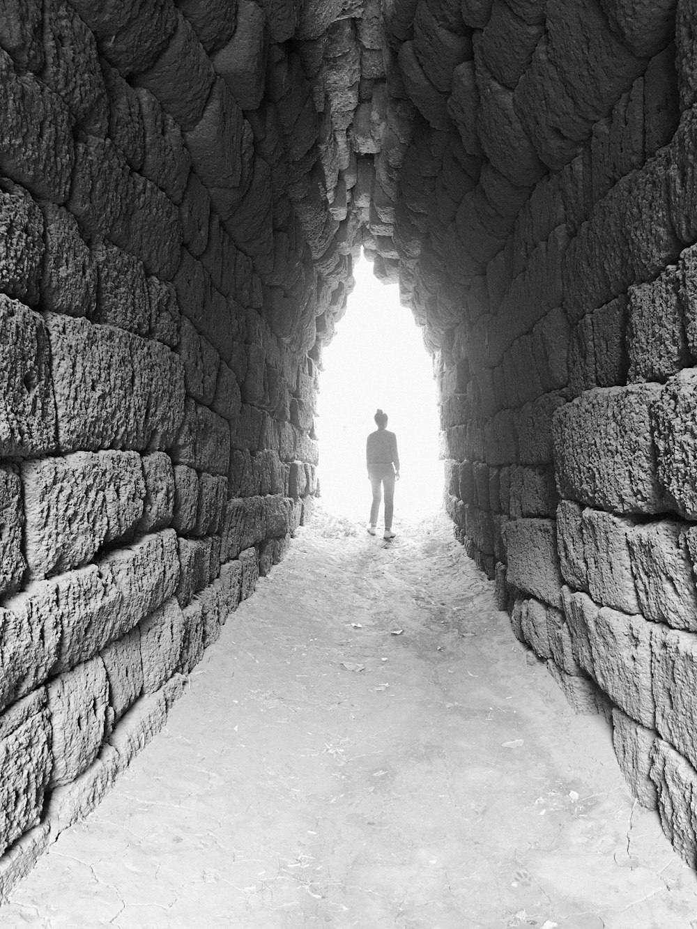 person standing on the tunnel