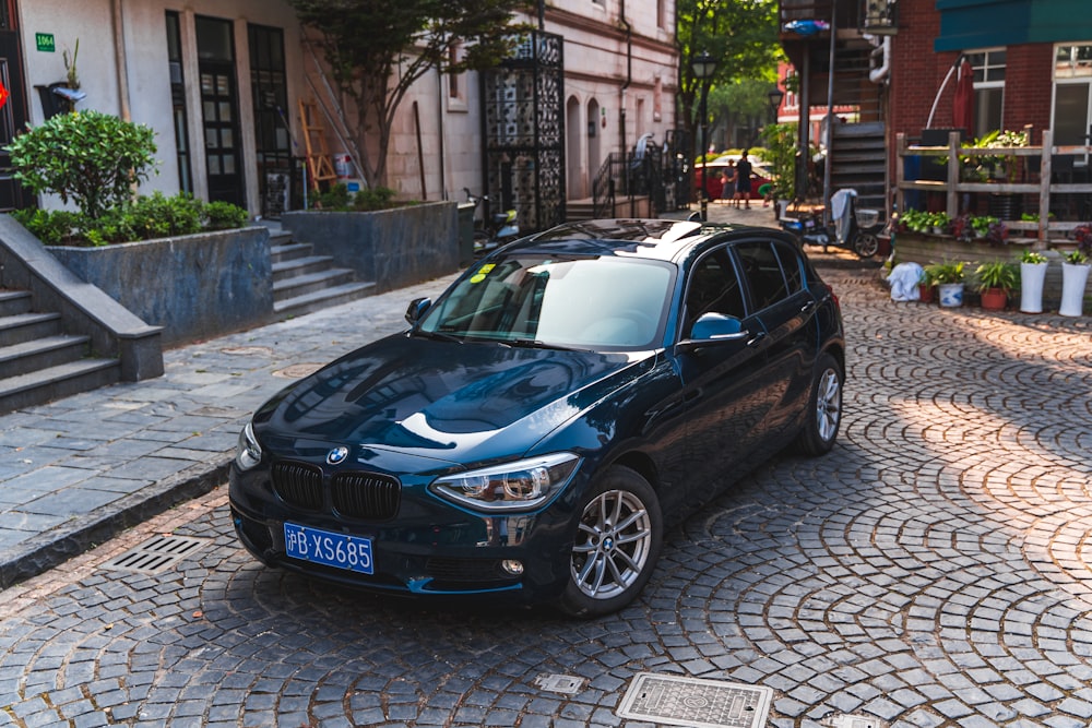 black BMW 5-door hatchback