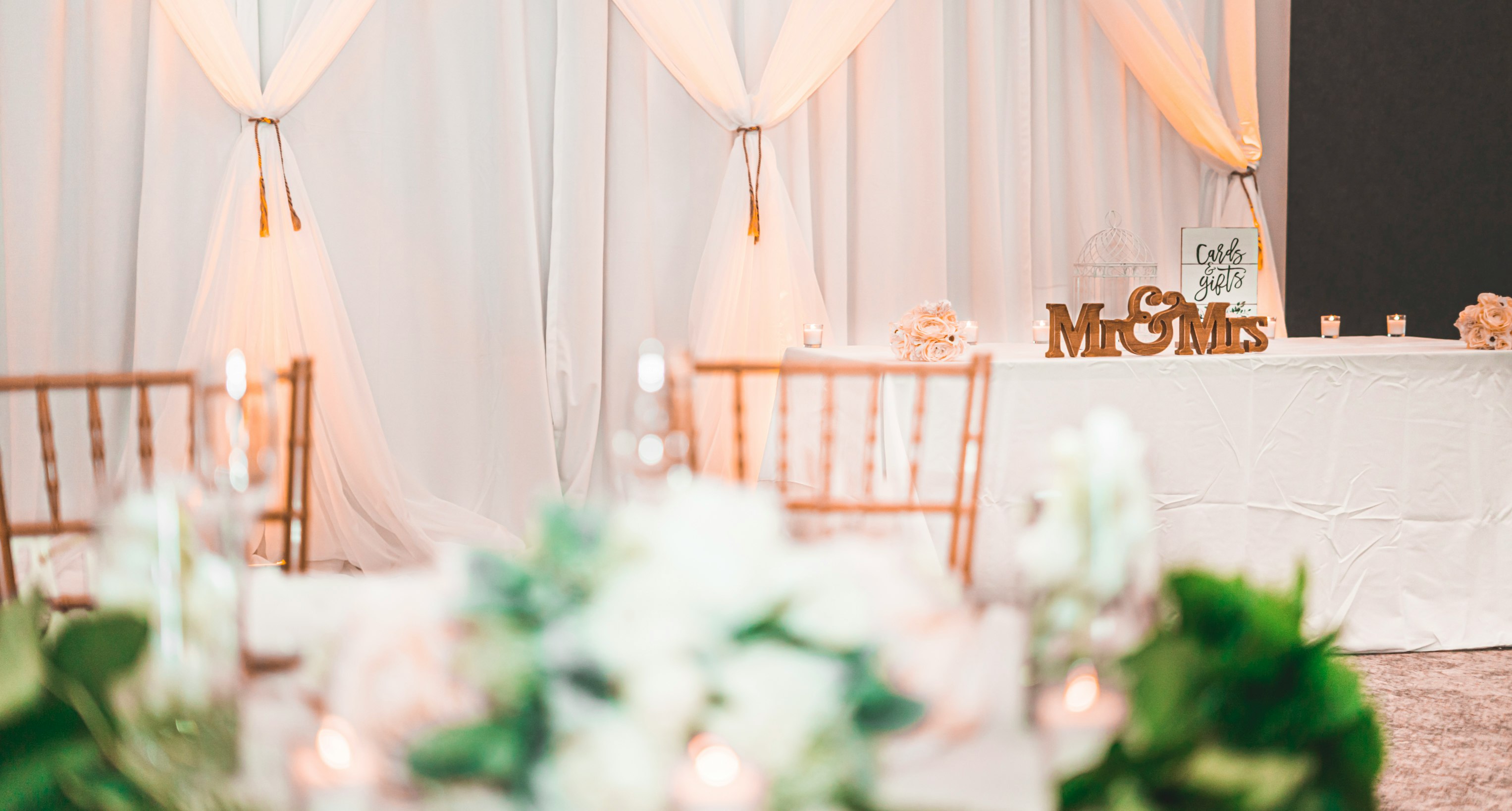 selective focus photography of chair beside table