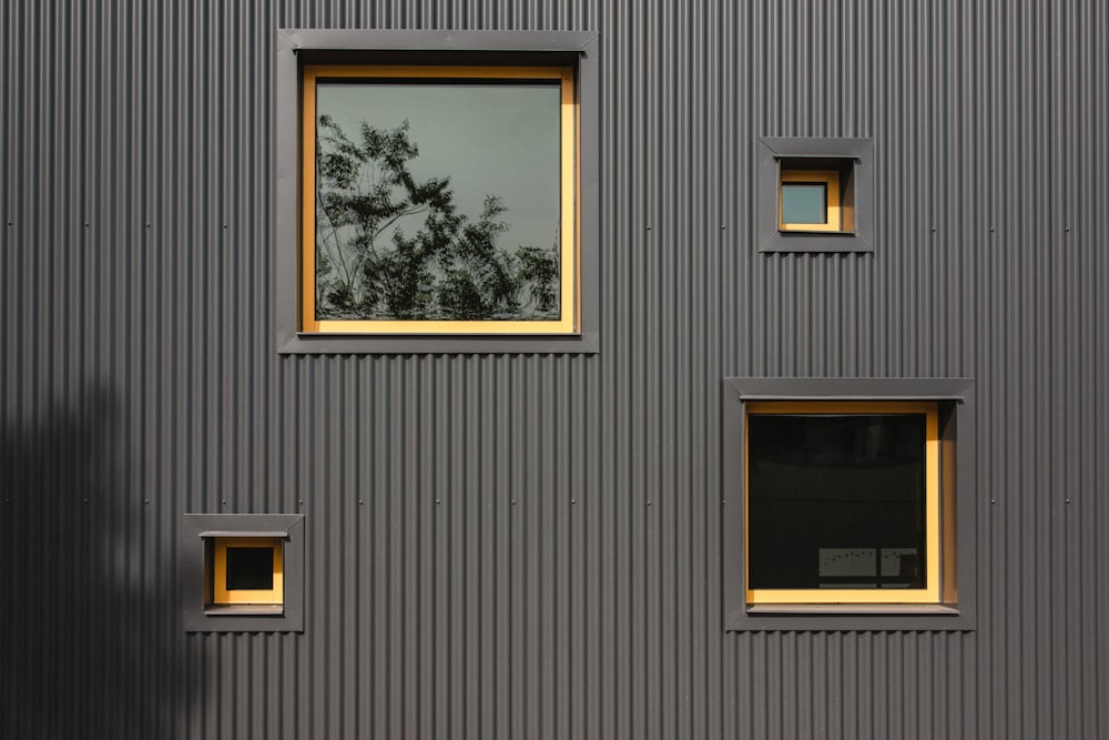 brass-colored framed and clear glass window