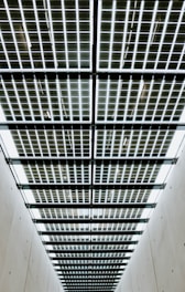 Infrared heating panels installed in a modern industrial warehouse.