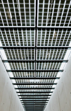 Symmetrical industrial factory floor showcasing efficient layout and structural clarity.