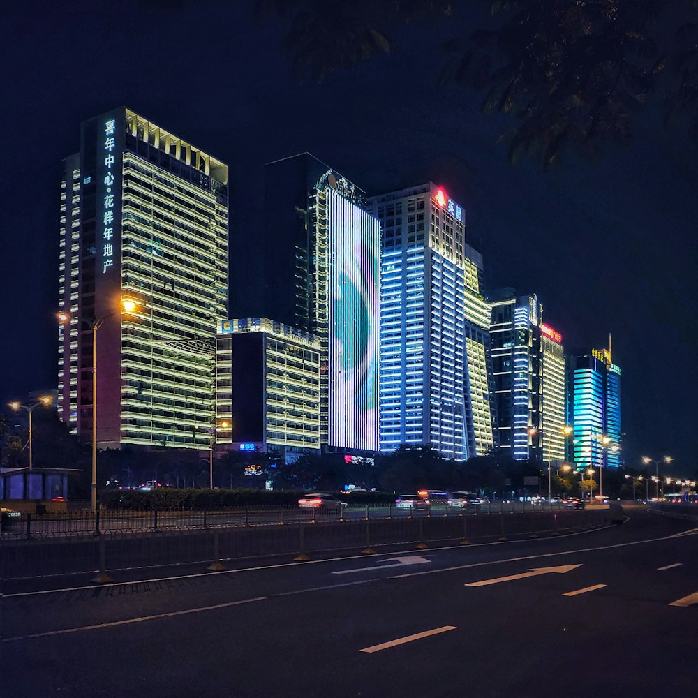 gray concrete city building during night time