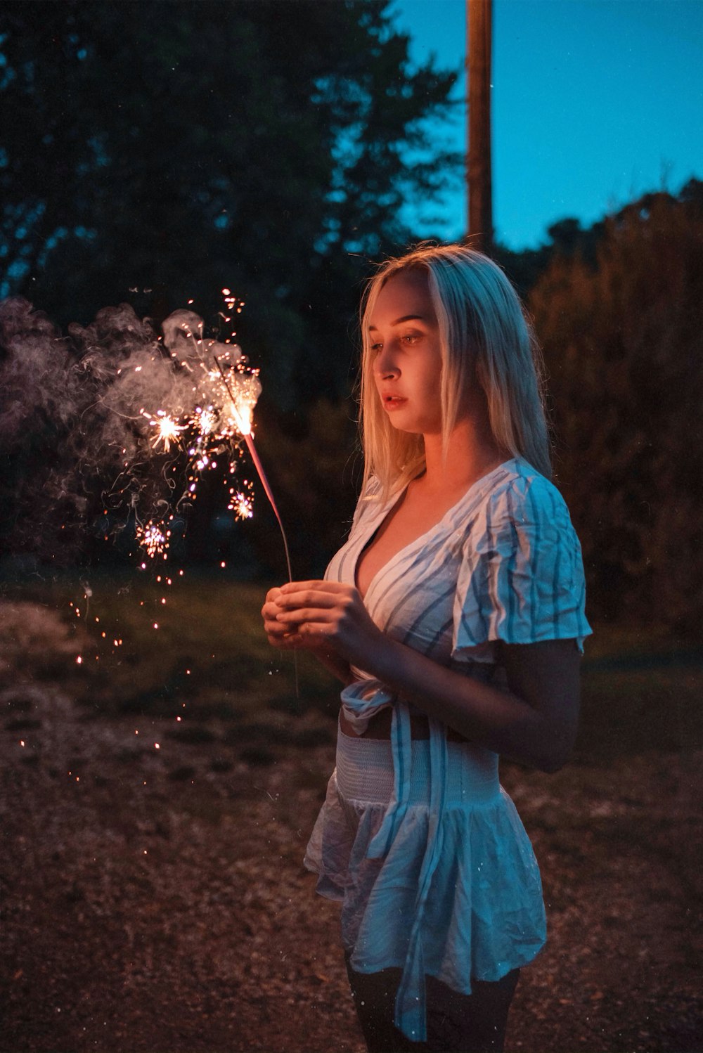 woman holding sparkler