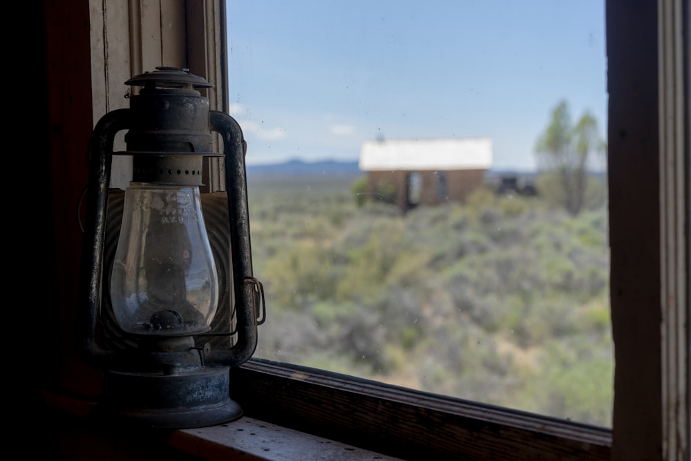 black framed kerosene lamp