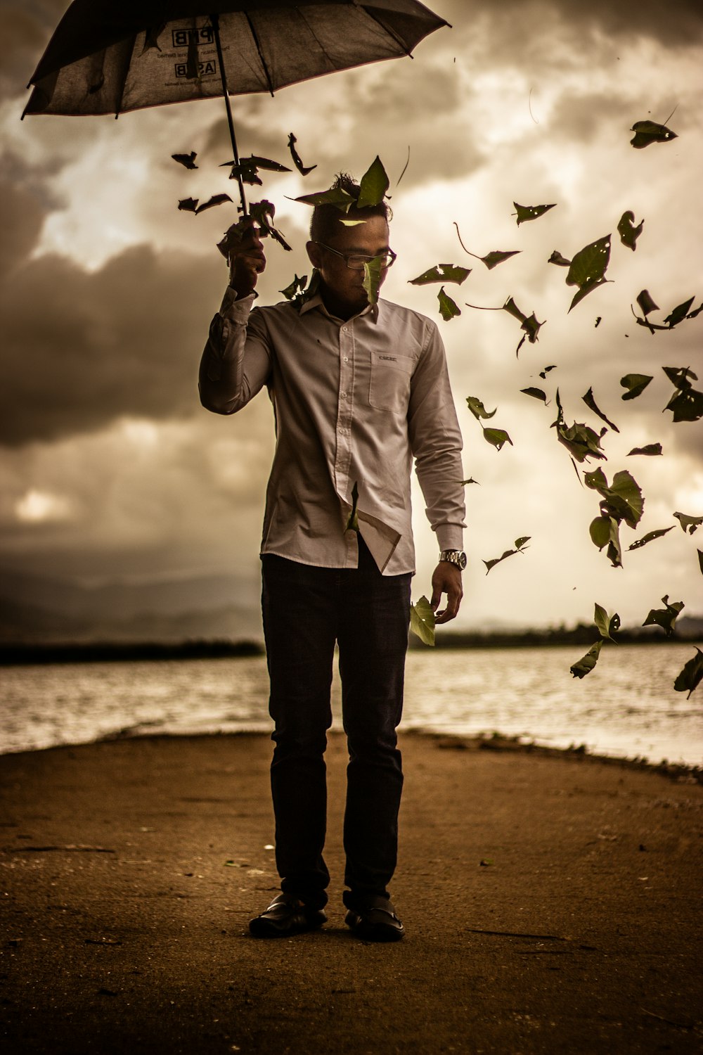 man holding umbrella