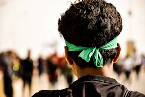 man in green headband