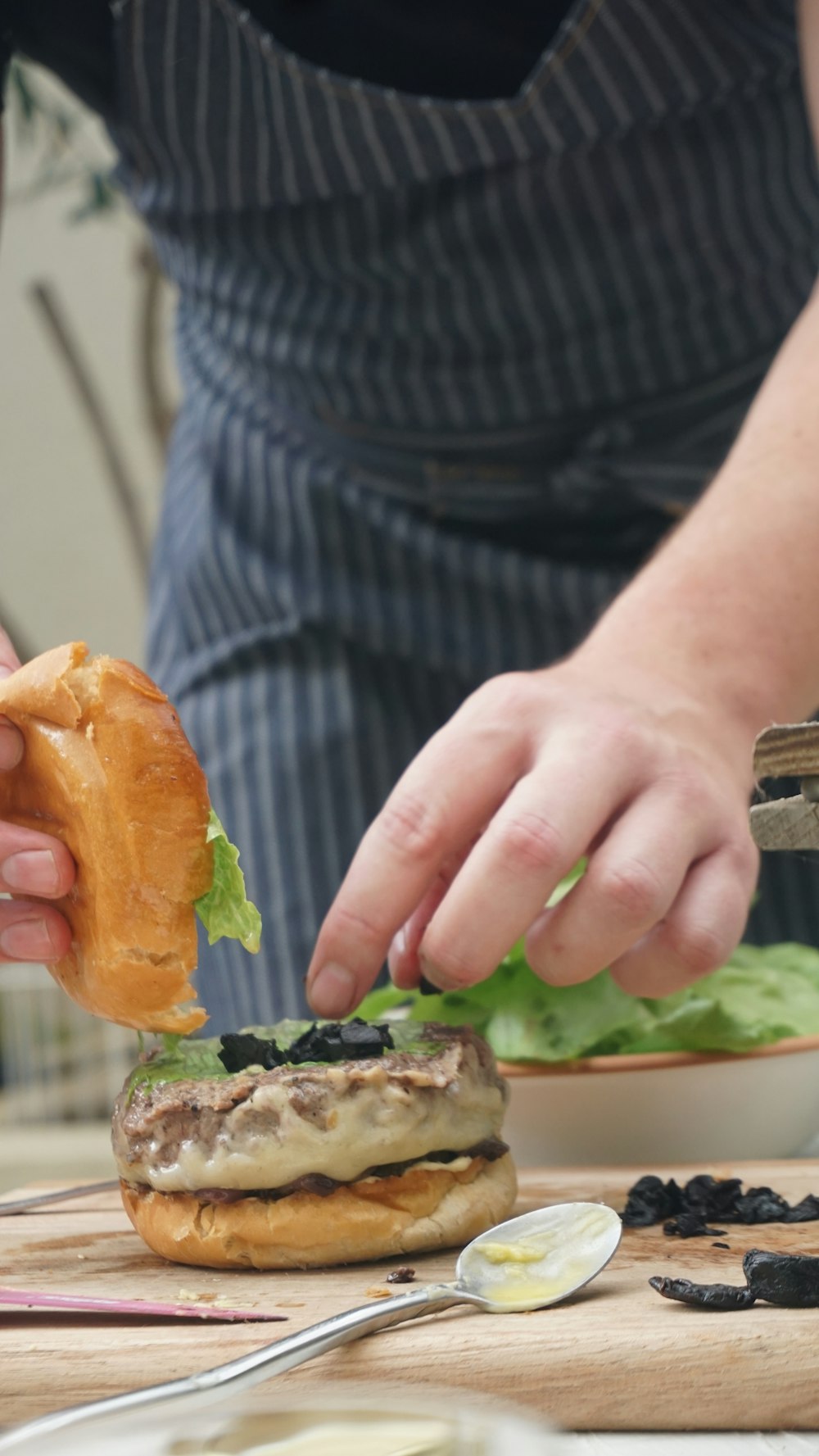 woman making burgers