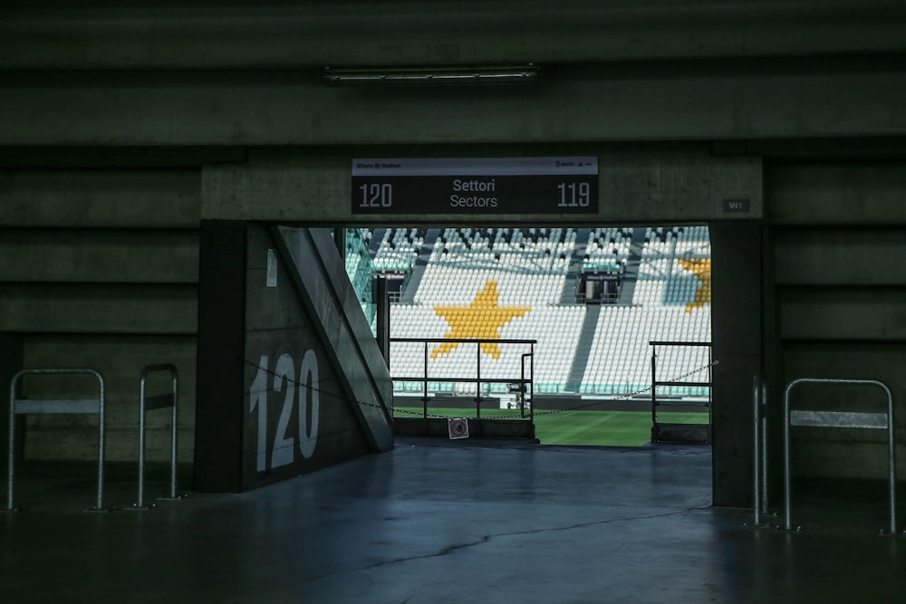 a view of a stadium from inside a tunnel