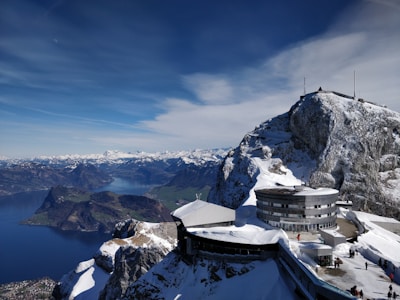house near cliff during daytime