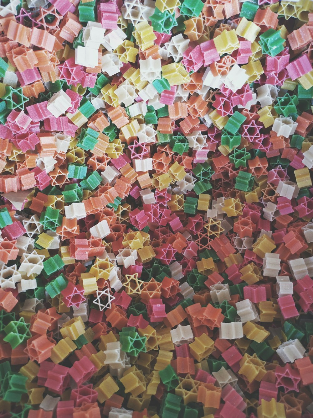 white, pink, and yellow star of David pasta