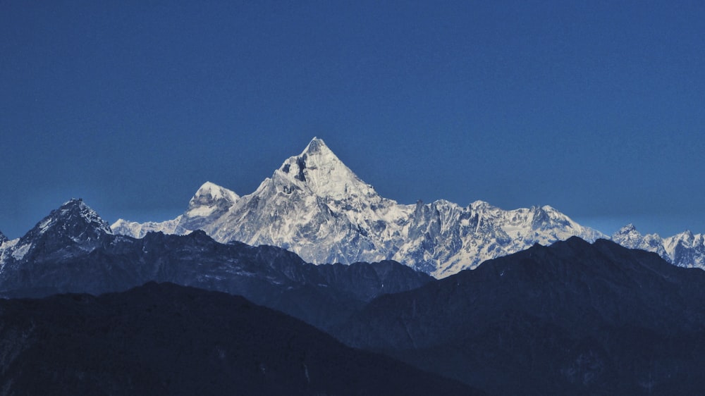 mountain range covered with snow