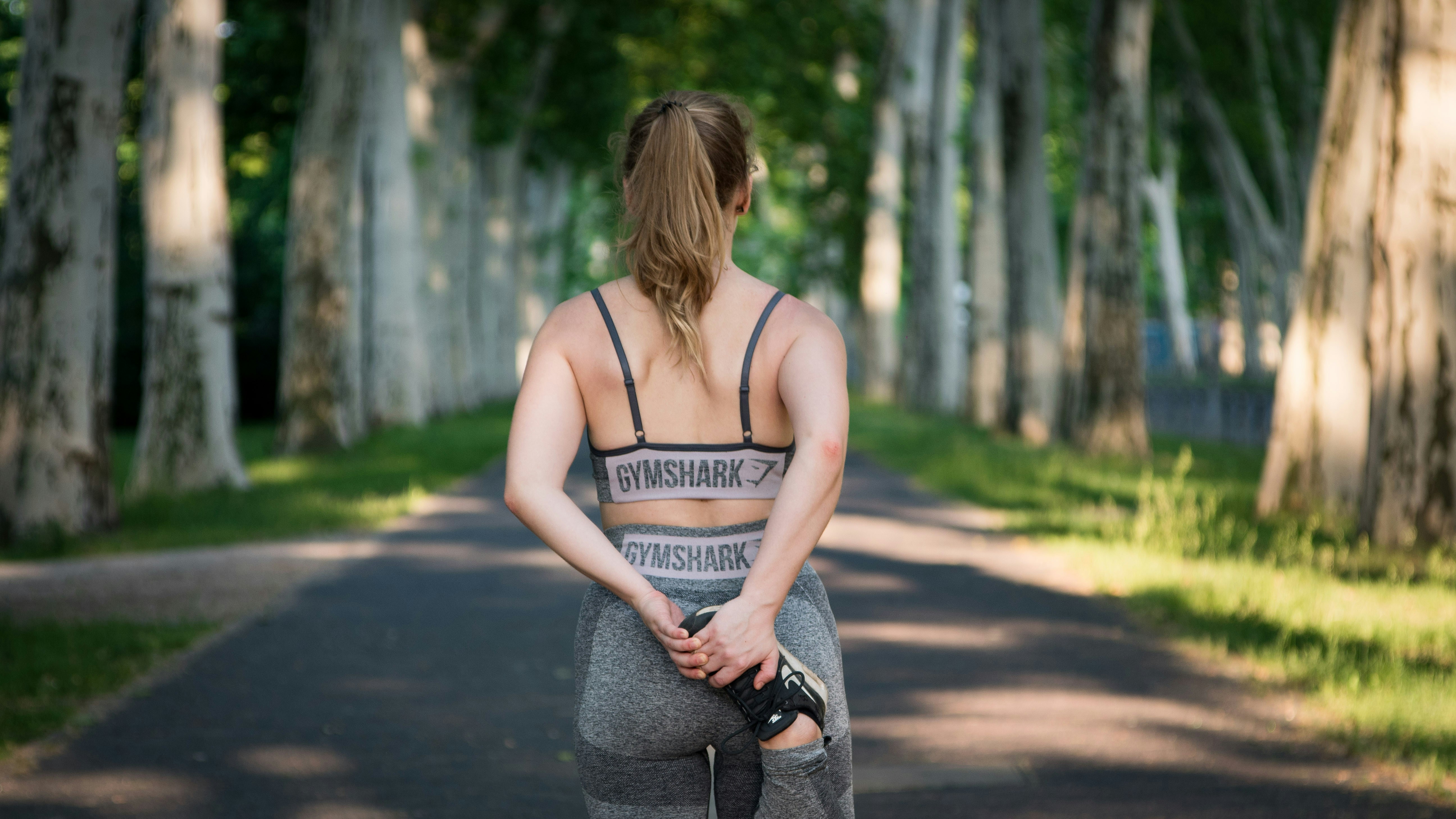 woman walking on road