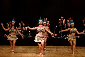group of women dancing on stage