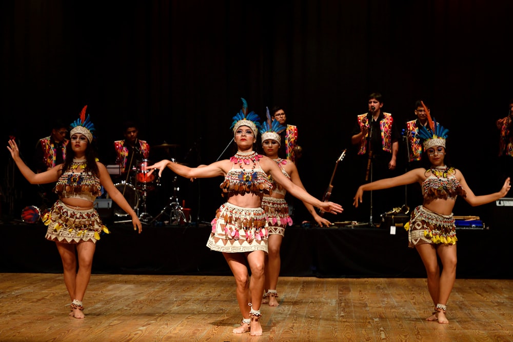 group of women dancing on stage