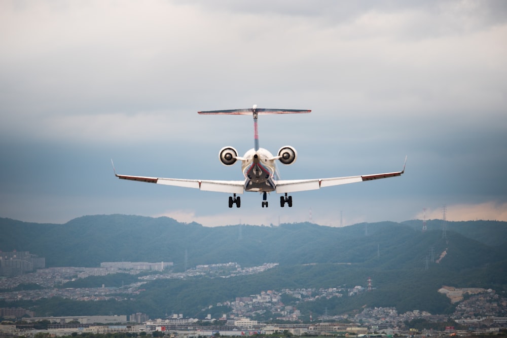 flying white and gray plane