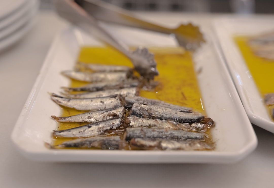sardines in white serving platter,