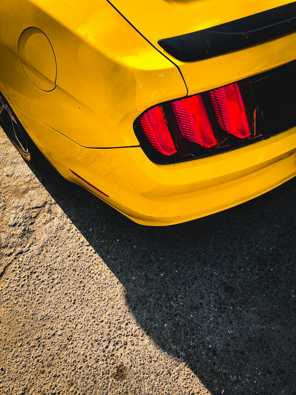 yellow vehicle showing taillight