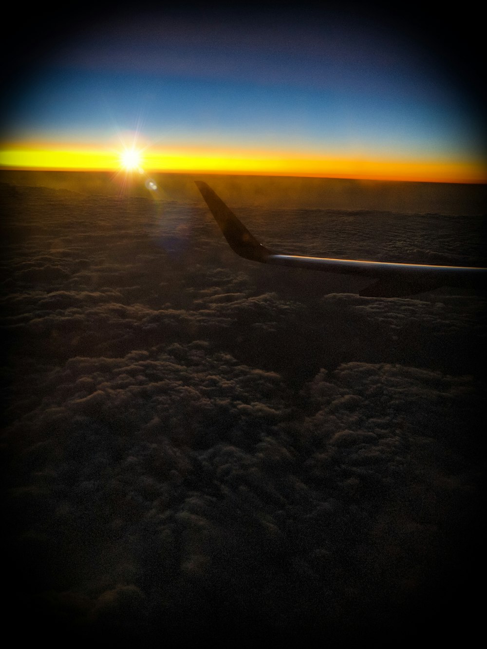 fish eye lens photo of plane's wing