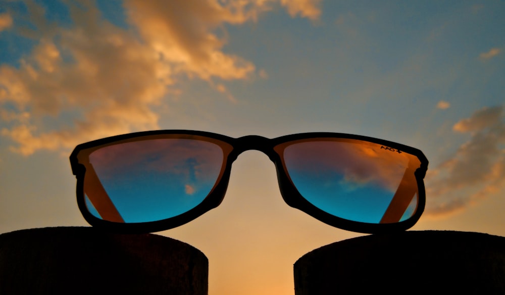 black-framed sunglasses