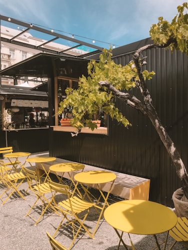 yellow metal outdoor dining sets
