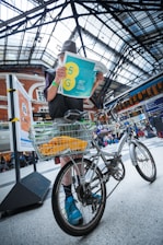 man standing near bicycle